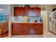 Kitchen featuring stainless steel appliances and granite countertops with stylish mosaic backsplash at 8740 Forest Lake Dr, Port Richey, FL 34668