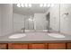 Bright bathroom vanity with double sinks, good lighting, and ample counter space at 891 Lantern Way # 13-103, Clearwater, FL 33765