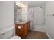 Bathroom vanity with modern sink, faucet, and a shower/tub combo at 891 Lantern Way # 13-103, Clearwater, FL 33765