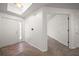 Bright entryway with neutral walls, tiled flooring, and direct access to a carpeted hallway at 891 Lantern Way # 13-103, Clearwater, FL 33765