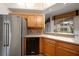Kitchen featuring stainless steel appliances and beautiful views from a window above the sink at 891 Lantern Way # 13-103, Clearwater, FL 33765