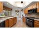 Kitchen nook with stainless appliances and tile backsplash at 891 Lantern Way # 13-103, Clearwater, FL 33765