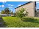 Spacious backyard with lush green lawn and privacy fence at 9402 59Th N St, Pinellas Park, FL 33782