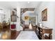 Inviting home foyer boasting wood floors, staircase, and views of the dining and living areas at 9402 59Th N St, Pinellas Park, FL 33782