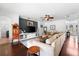 Open-concept living room featuring a large sectional sofa and stylish decor at 9402 59Th N St, Pinellas Park, FL 33782