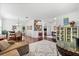 Open-concept living room with wood floors, a dining area, and plenty of natural light at 9402 59Th N St, Pinellas Park, FL 33782