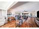 Spacious living area with hardwood floors, modern furniture, and an open-concept layout at 100 Bluff View Dr # 614A, Belleair Bluffs, FL 33770
