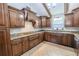 Updated kitchen featuring granite countertops, stainless appliances, and custom cabinets at 10100 Grove Dr, Port Richey, FL 34668