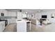 Open-concept kitchen with a breakfast bar and easy access to the living area at 10385 Winnipeg St, Port Charlotte, FL 33981