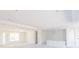 Spacious living room featuring recessed lighting and a large window for ample natural light at 10385 Winnipeg St, Port Charlotte, FL 33981