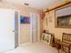 Functional spare room with neutral tile floors, a window, and closets at 10402 N Boulevard, Tampa, FL 33612