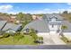 Aerial view of the neighborhood showcases the roof and a two-car garage at 11722 Currie Ln # B3, Largo, FL 33774