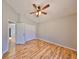 Bedroom showcasing wood floors, vaulted ceiling, and closet at 13719 Artesa Bell Dr, Riverview, FL 33579
