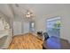 Light and airy bedroom with a ceiling fan and wood-look flooring at 13719 Artesa Bell Dr, Riverview, FL 33579