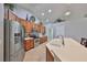 Well-equipped kitchen boasting stainless steel appliances, ample cabinet space, and a functional layout at 13719 Artesa Bell Dr, Riverview, FL 33579