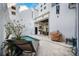 Private backyard with a small pool, an outdoor kitchen, and a relaxing lounge area at 145 16Th Ne Ave, St Petersburg, FL 33704