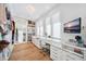 Spacious closet with custom shelving, full length mirror, television, and natural light at 145 16Th Ne Ave, St Petersburg, FL 33704