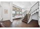 Entryway boasting hardwood floors, a modern staircase, and an open floorplan allowing for an airy feel at 145 16Th Ne Ave, St Petersburg, FL 33704