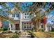 Charming home with a covered front porch, manicured landscaping, and a welcoming entrance at 145 16Th Ne Ave, St Petersburg, FL 33704