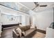 Open living room with tall ceiling, a contemporary sofa, and access to the home's second story at 145 16Th Ne Ave, St Petersburg, FL 33704