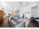 Open-concept living area boasts hardwood floors, modern decor and an abundance of natural light at 145 16Th Ne Ave, St Petersburg, FL 33704