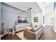 Comfortable living room boasts high ceilings, natural light, modern furnishings, and stylish decor accents at 145 16Th Ne Ave, St Petersburg, FL 33704
