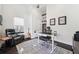 Modern home office featuring a large rug, a vaulted ceiling and a comfortable leather chair at 145 16Th Ne Ave, St Petersburg, FL 33704
