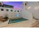 A private pool with built-in seating and water features at 145 16Th Ne Ave, St Petersburg, FL 33704