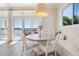 Bright dining area with water views at 16327 Redington Dr, Redington Beach, FL 33708