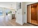 Modern home elevator with wood paneling and stylish lighting, showcasing accessibility at 16327 Redington Dr, Redington Beach, FL 33708