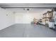 Spacious garage provides ample room for parking and storage, featuring a durable epoxy floor at 16327 Redington Dr, Redington Beach, FL 33708