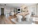 Spacious living and dining area featuring an open layout and stylish, modern decor at 16327 Redington Dr, Redington Beach, FL 33708