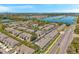 Expansive aerial view of a well-planned community near a beautiful lake at 2028 Kings Palace Dr # 202, Riverview, FL 33578