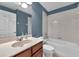 Cozy bathroom includes a single vanity, toilet and tiled tub-shower combo at 2028 Kings Palace Dr # 202, Riverview, FL 33578