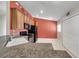 Inviting kitchen featuring tiled floors, ample cabinetry, and modern appliances for cooking at 2028 Kings Palace Dr # 202, Riverview, FL 33578