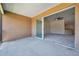 A spacious patio with sliding glass doors leads into a light-filled living space at 2028 Kings Palace Dr # 202, Riverview, FL 33578
