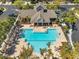 Inviting pool area features ample lounge seating and a shaded clubhouse at 2028 Kings Palace Dr # 202, Riverview, FL 33578