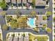 Aerial view of a resort-style pool area with lush landscaping at 2028 Kings Palace Dr # 202, Riverview, FL 33578