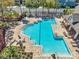 Well-maintained pool with ample seating for relaxation in a private community at 2028 Kings Palace Dr # 202, Riverview, FL 33578