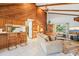 Inviting living room featuring vaulted wood ceilings and bar, plus a comfortable seating area at 2112 Laurence Dr, Clearwater, FL 33764