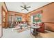 Cozy living room with plush seating, warm lighting, and classic decor at 2112 Laurence Dr, Clearwater, FL 33764