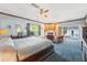 Main bedroom features a fireplace, sitting area, and access to outdoor areas at 2112 Laurence Dr, Clearwater, FL 33764