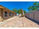 The brick backyard includes a small firepit and dead tree in mulch at 2121 Park N St, St Petersburg, FL 33710
