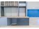 Stylish bar area with custom cabinetry, butcher block countertop, open shelving, and subway tile backsplash at 2121 Park N St, St Petersburg, FL 33710
