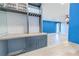 Chic bar area featuring a built-in cabinet, butcher block countertop, and open access to the living room at 2121 Park N St, St Petersburg, FL 33710