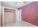 Bedroom with closet and view into hallway at 2121 Park N St, St Petersburg, FL 33710