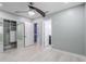 Bedroom boasts custom closet and open doorway to bathroom at 2121 Park N St, St Petersburg, FL 33710