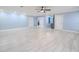 Spacious living room boasts modern flooring, ample natural light, and a welcoming open layout at 2121 Park N St, St Petersburg, FL 33710