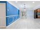 Spacious living area with hardwood floors, modern lighting, and ample natural light at 2121 Park N St, St Petersburg, FL 33710