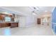 Open-concept living space with a view of a renovated kitchen, featuring an open design and lots of natural light at 2121 Park N St, St Petersburg, FL 33710